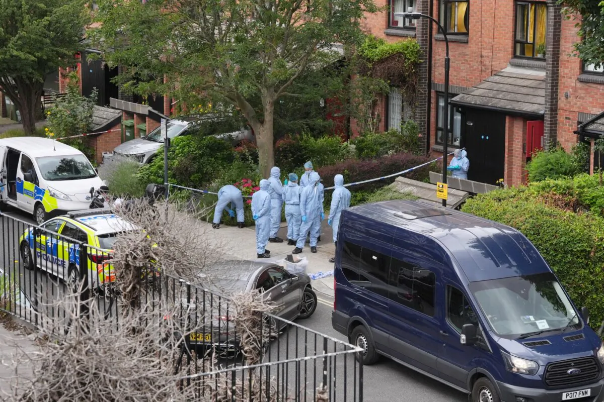 Police forensics teams working on the investigation into the murder of two men whose remains were found at Clifton, near Bristol, at a house in Shepherd's Bush, west London on July 13, 2024. (Jonathan Brady/PA Wire)
