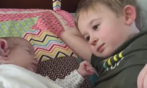 Little Boy Sings for Baby Sister