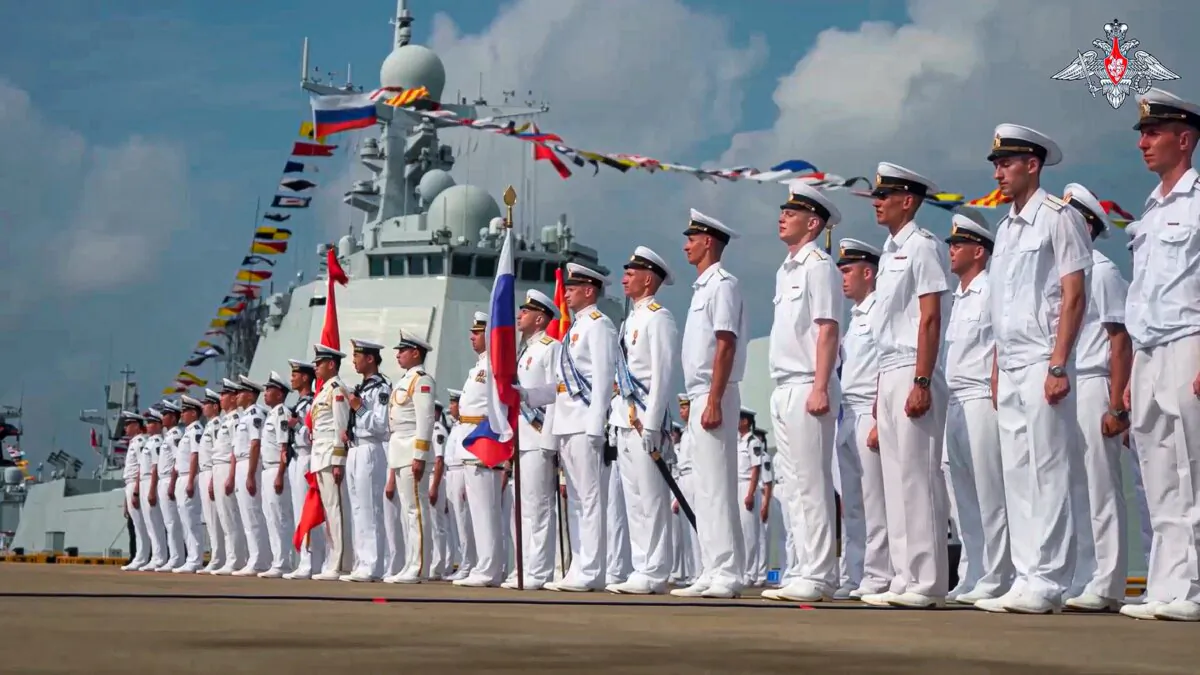 Russian military sailors attend a welcome ceremony of their joint naval forces exercise in Zhanjiang, Guangdong province, China, on July 14, 2024. (Russian Defense Ministry Press Service via AP)