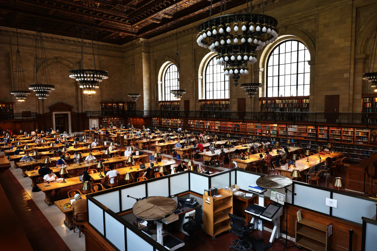People study in the Rose Main Reading Room of the New York Public Library on July 6, 2021 in Midtown Manhattan in New York City. (Michael M. Santiago/Getty Images)