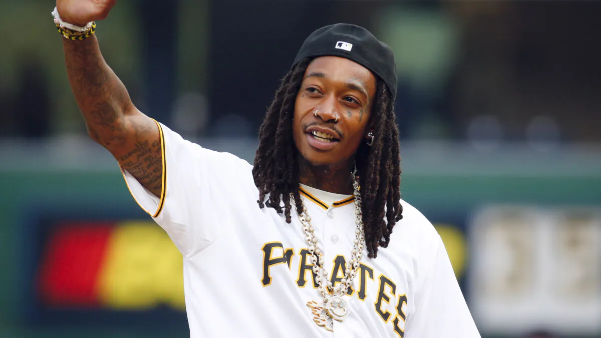 Wiz Khalifa waves to the crowd before the game between the Cleveland Guardians and the Pittsburgh Pirates at PNC Park in Pittsburgh, Pennsylvania, on July 17, 2023. (Justin K. Aller/Getty Images)