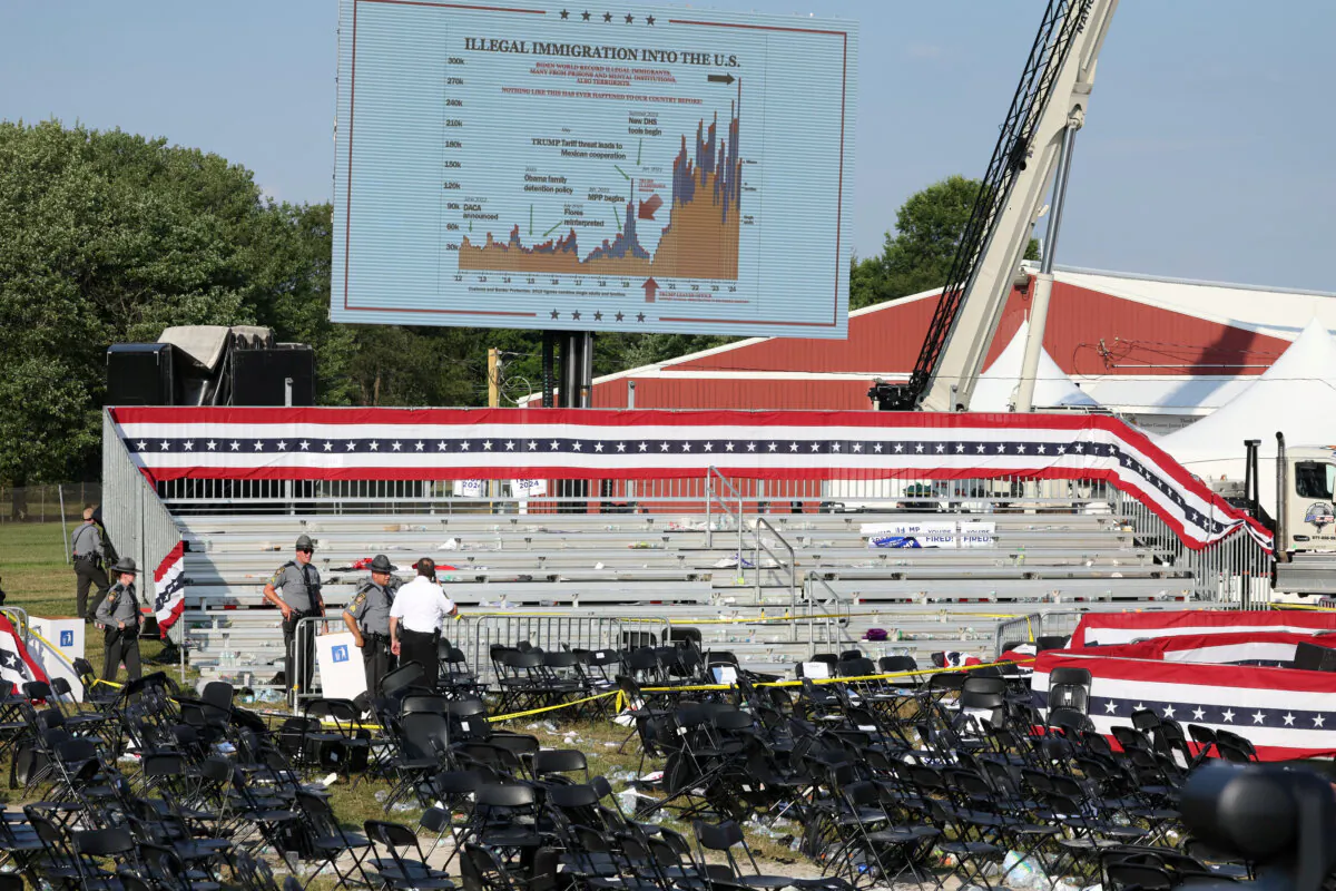 Security personnel inspect the site after gunfire rang out during a campaign rally at the Butler Farm Show in Butler, Pa., July 13, 2024. (Brendan McDermid/Reuters)