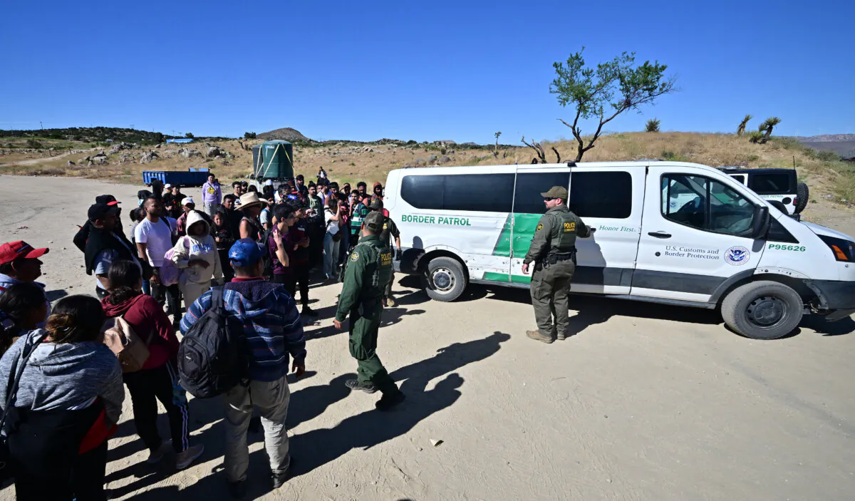 Customs and Border Patrol officers arrive with a vehicle after a group of illegal immigrants walked from Mexico into the United States at Jacumba Hot Springs, Calif., on June 5, 2024. (Frederic J. Brown/AFP via Getty Images)