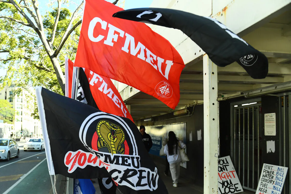 Construction, Forestry, Maritime, Mining and Energy Union (CFMEU) signs in Brisbane, Australia on July 16, 2024. (AAP Image/Jono Searle)