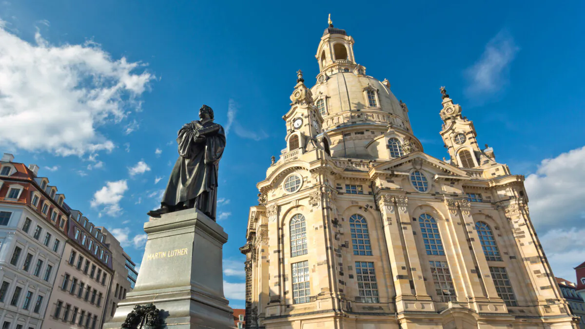 A statue of Protestant reformer Martin Luther looms large outside the lovingly rebuilt Frauenkirche, which had lain in ruins for nearly six decades since being destroyed in the Allied firebombing of Dresden in World War II. (Dominic Arizona Bonuccelli, Rick Steves’ Europe)