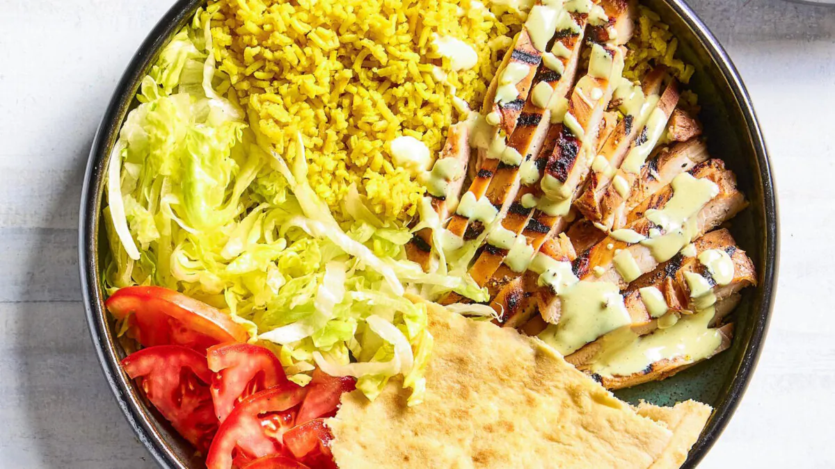 This recipe combines the tender, marinated chicken breasts with a zesty white sauce that's a perfect complement to the smoky char of the grill. (Beth Fuller/TNS)