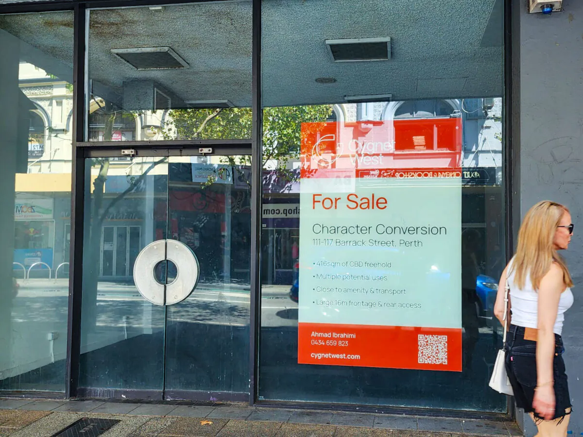A for sale sign is seen in the window of an empty shop front in Perth, Western Australia, on March 18, 2024. (Susan Mortimer/The Epoch Times)