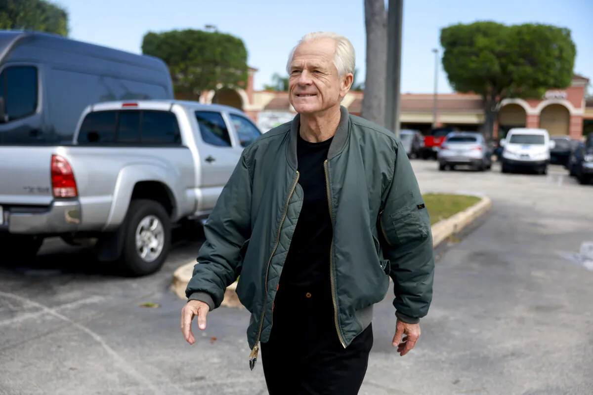 Peter Navarro, former adviser to President Donald Trump, arrives for a press conference before turning himself in to a federal prison in Miami, Fla., on March 19, 2024. (Joe Raedle/Getty Images)