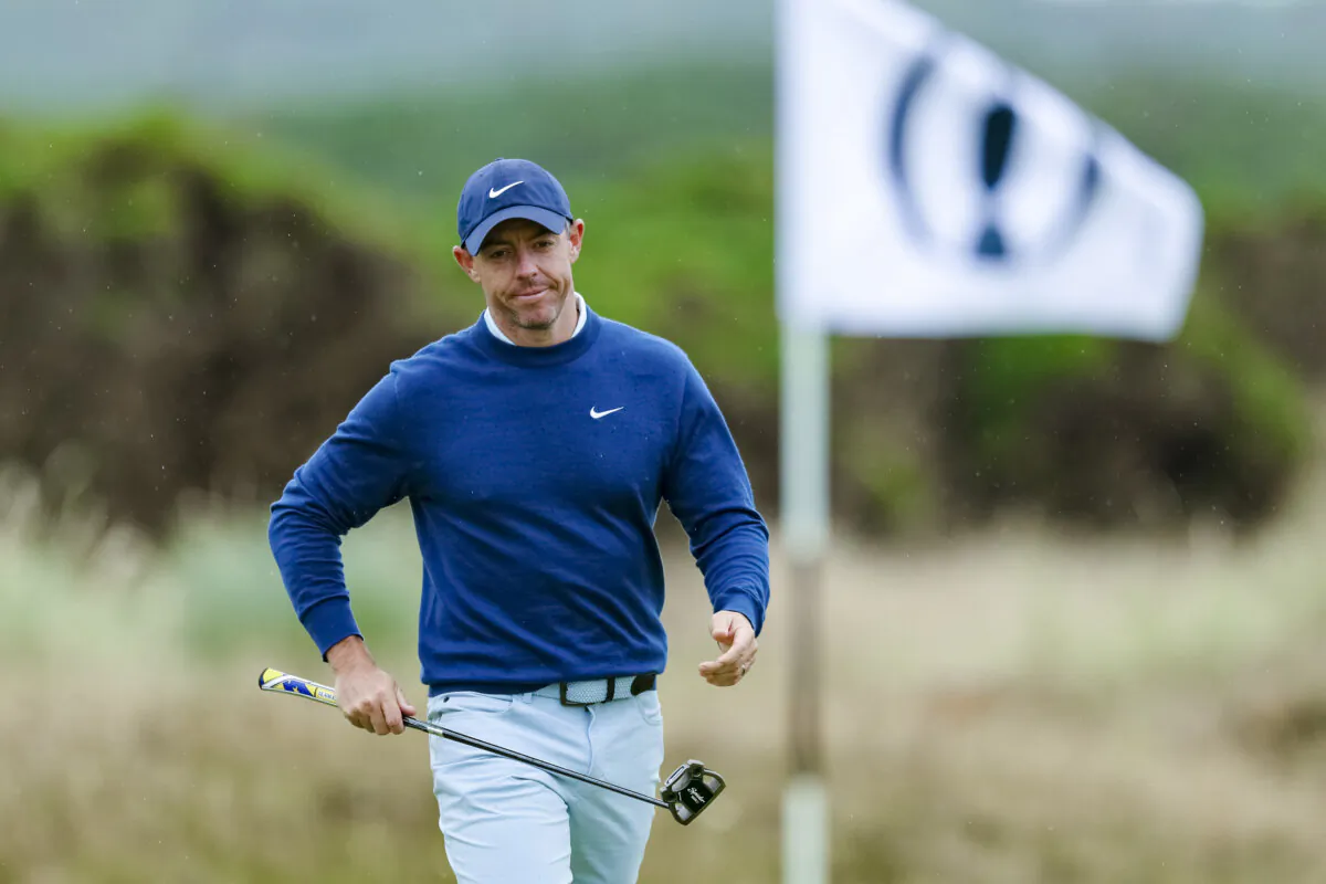Rory McIlroy of Northern Ireland reacts on the 13th green during a practice round prior to The 152nd Open championship at Royal Troon in Troon, Scotland, on July 16, 2024. (Harry How/Getty Images)