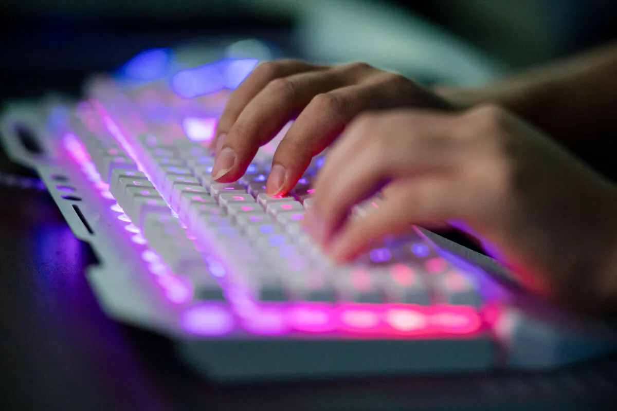 An unnamed Chinese hacker uses a computer at an office in Dongguan, in China's southern Guangdong Province, on Aug. 4, 2020. (Nicolas Asfouri/AFP via Getty Images)