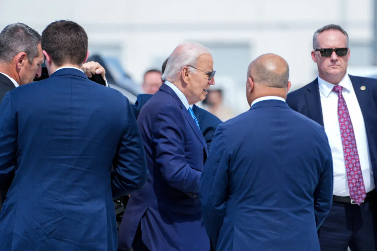 President Joe Biden exits his motorcade on his way to board Air Force One as he departs Harry Reid International Airport in Las Vegas on July 17, 2024, en route to Delaware. (Kent Nishimura/AFP via Getty Images)