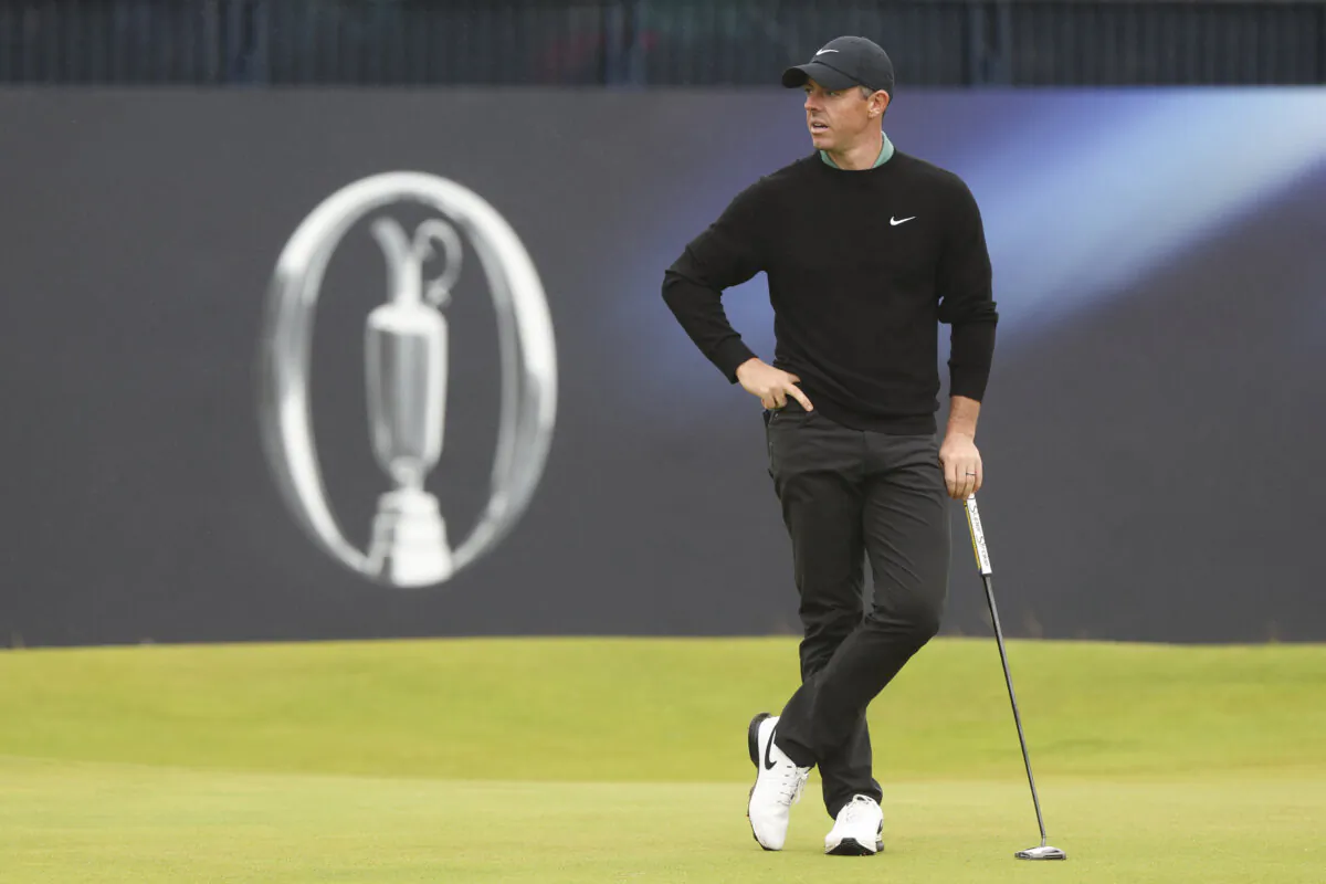 Rory McIlroy of Northern Ireland waits to putt on the 18th green during his opening round of the British Open Golf Championships at Royal Troon golf club in Troon, Scotland,on July 18, 2024. (Scott Heppell/AP Photo)