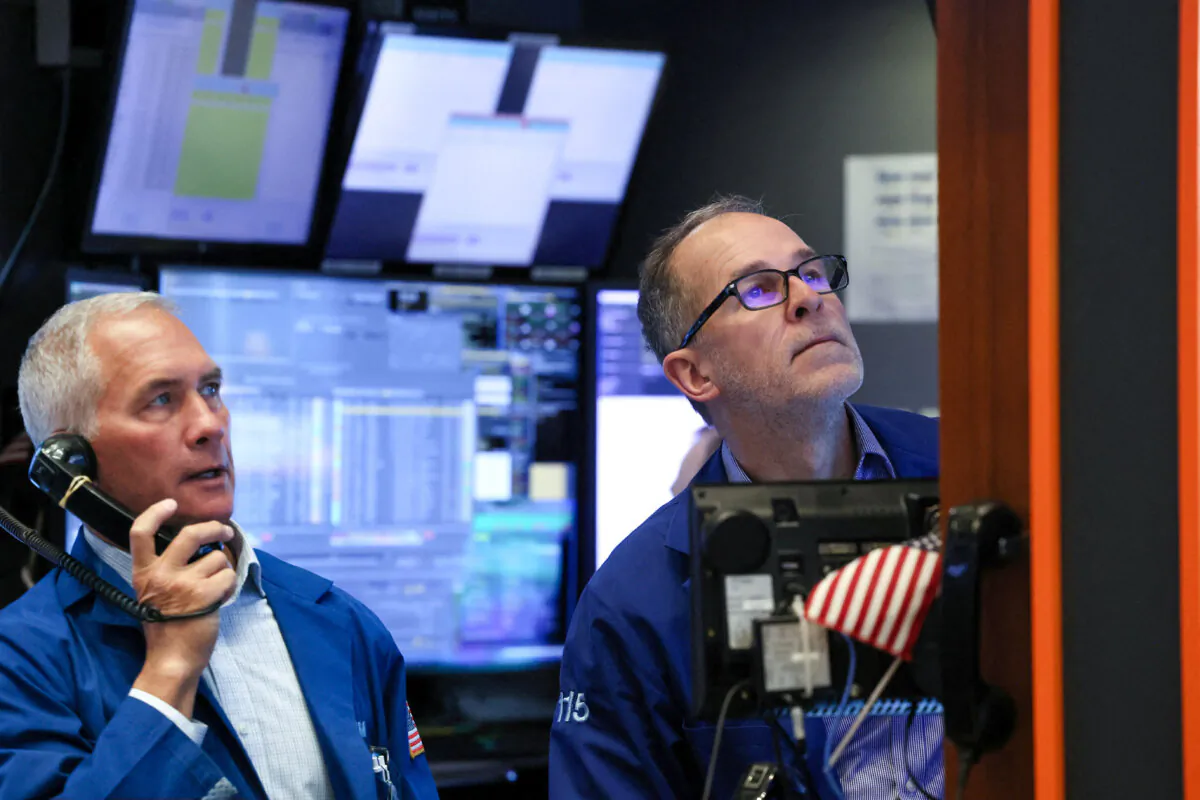 Traders work on the floor at the New York Stock Exchange in New York City on Jan. 29, 2024. (Brendan McDermid/Reuters)