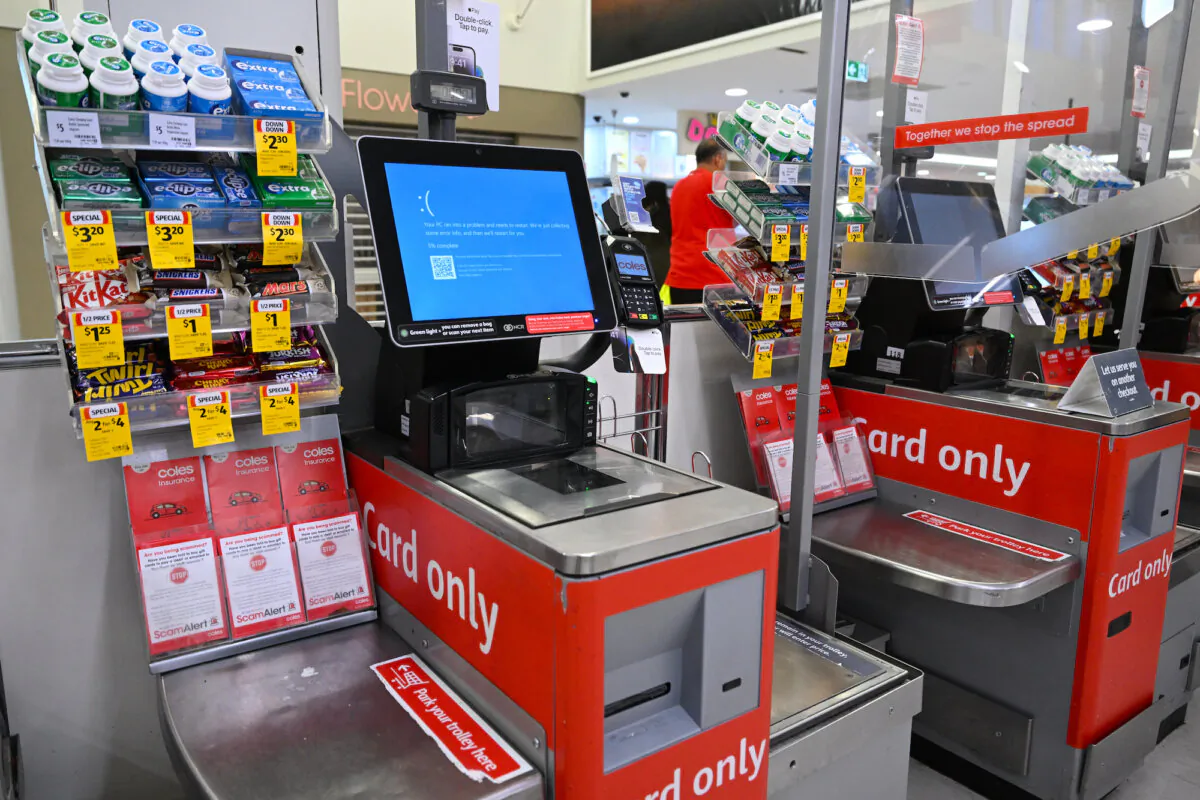 A checkout terminal hit by IT issues is seen at a Coles store in Canberra, July 19, 2024. Australian banks and media companies have been hit by a major IT outage. (AAP Image/Lukas Coch)