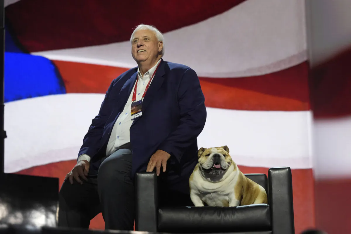 West Virginia Gov. Jim Justice checks out the stage with his dog, "Babydog," before the Republican National Convention in Milwaukee on July 16, 2024. (Jae C. Hong/AP Photo)