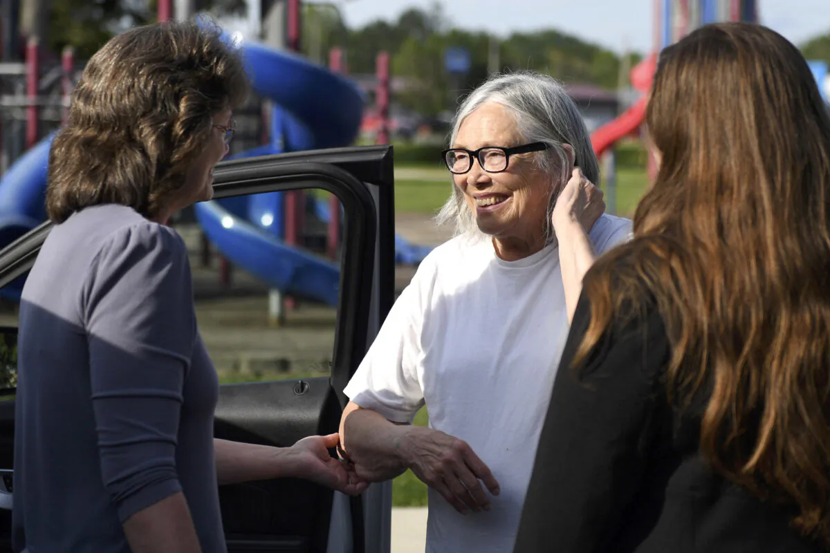 Sandra Hemme (C) meets with family and supporters after she was released from Chillicothe Correctional Center in Chillicothe, Miss., on July 19, 2024. (HG Biggs/The Kansas City Star via AP)