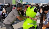 Man Wins a Big Toy at Carnival and Gives It to Little Boy to Make Him Happy