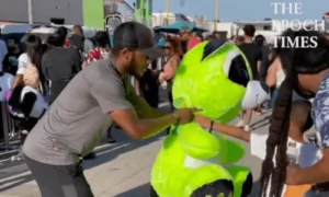 Man Wins a Big Toy at Carnival and Gives It to Little Boy to Make Him Happy