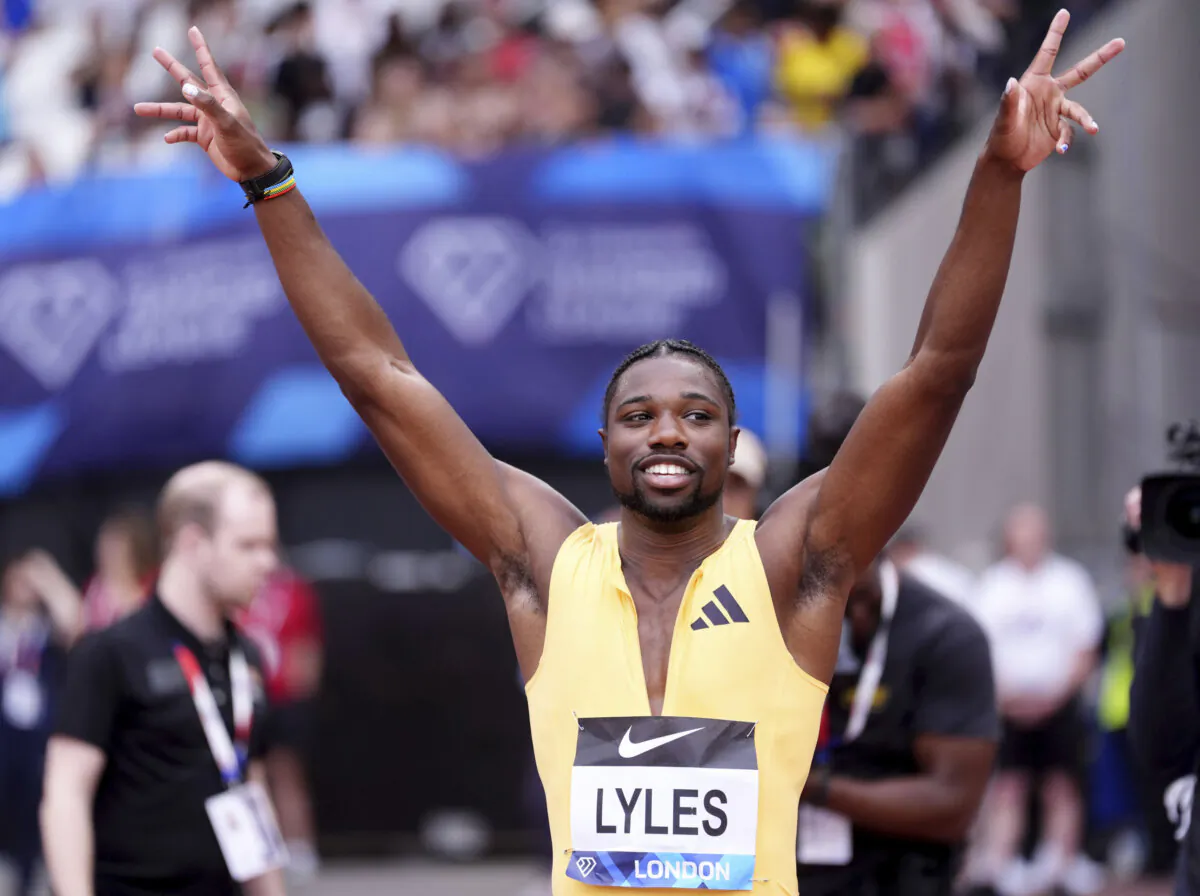 Winner Noah Lyles of the U.S. celebrates after the Men's 100m Final during the Diamond League London Athletics Meet in London on July 20, 2024. (Adam Davy/PA via AP)