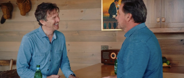 Two men in blue shirts in a kitchen in BRATS