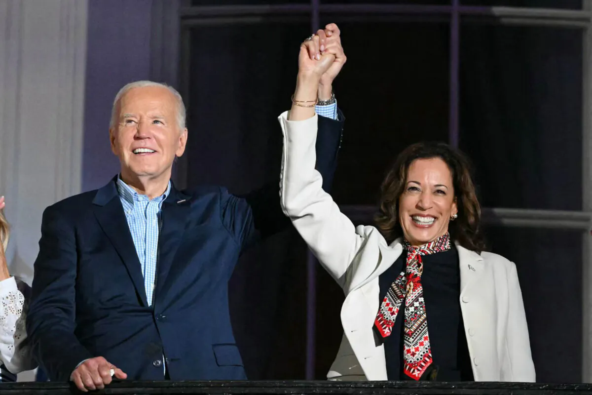 President Joe Biden and Vice President Kamala Harris as they arrive to watch the Independence Day fireworks display from the Truman Balcony of the White House on July 4, 2024. President Biden on July 21 announced that he is no longer seeking reelection and endorsed Ms. Harris. (Mandal Ngan/AFP via Getty Images)