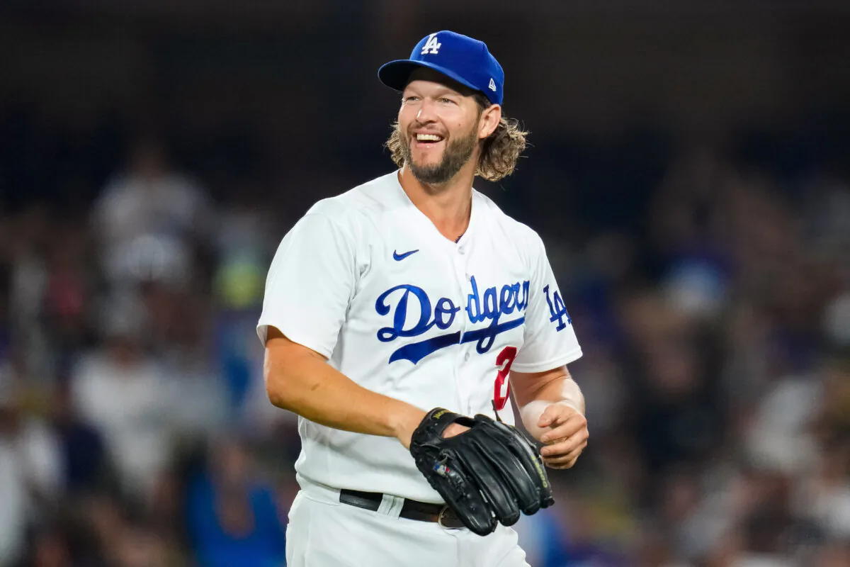Los Angeles Dodgers pitcher Clayton Kershaw reacts after a nice defensive play behind him in a game against the San Francisco Giants in Los Angeles on Sept. 23, 2023. (Ashley Landis/AP Photo)