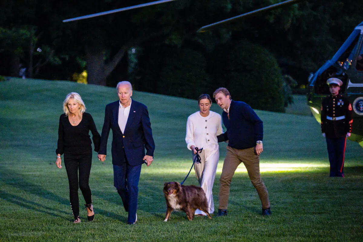 President Joe Biden, First Lady Jill Biden, grandaugher Naomi Biden and fiance Peter Neal walk to the White House from Marine One, in Washington, on June 20, 2022. (Pete Marovich/Getty Images)