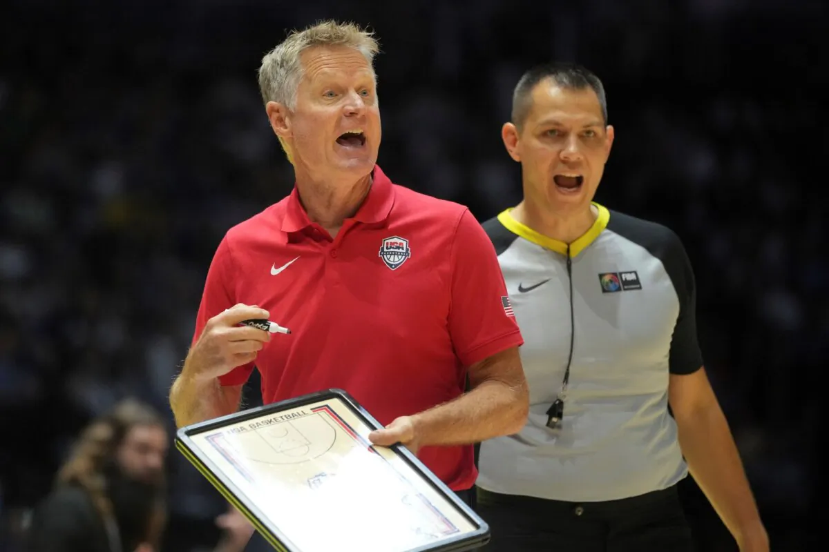 United States Coach Steve Kerr instructs his players during a men's basketball exhibition game against South Sudan in London on July 20, 2024. (Kin Cheung/AP Photo)