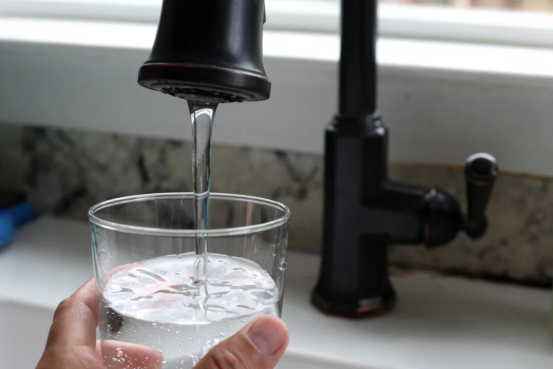 Water from a tap fills a glass in San Anselmo, Calif., on July 6, 2023. (Justin Sullivan/Getty Images)