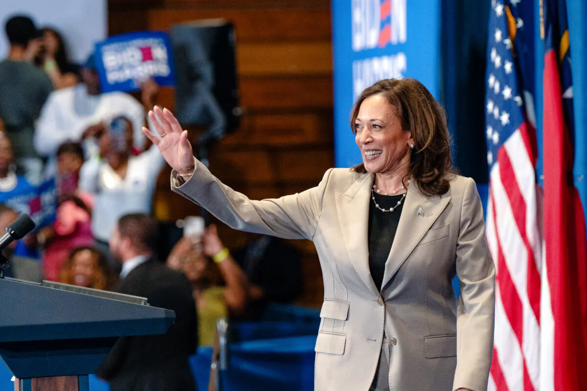 Vice President Kamala Harris waves during a campaign event at Westover High School in Fayetteville, N.C., on July 18, 2024. (Allison Joyce/AFP via Getty Images)