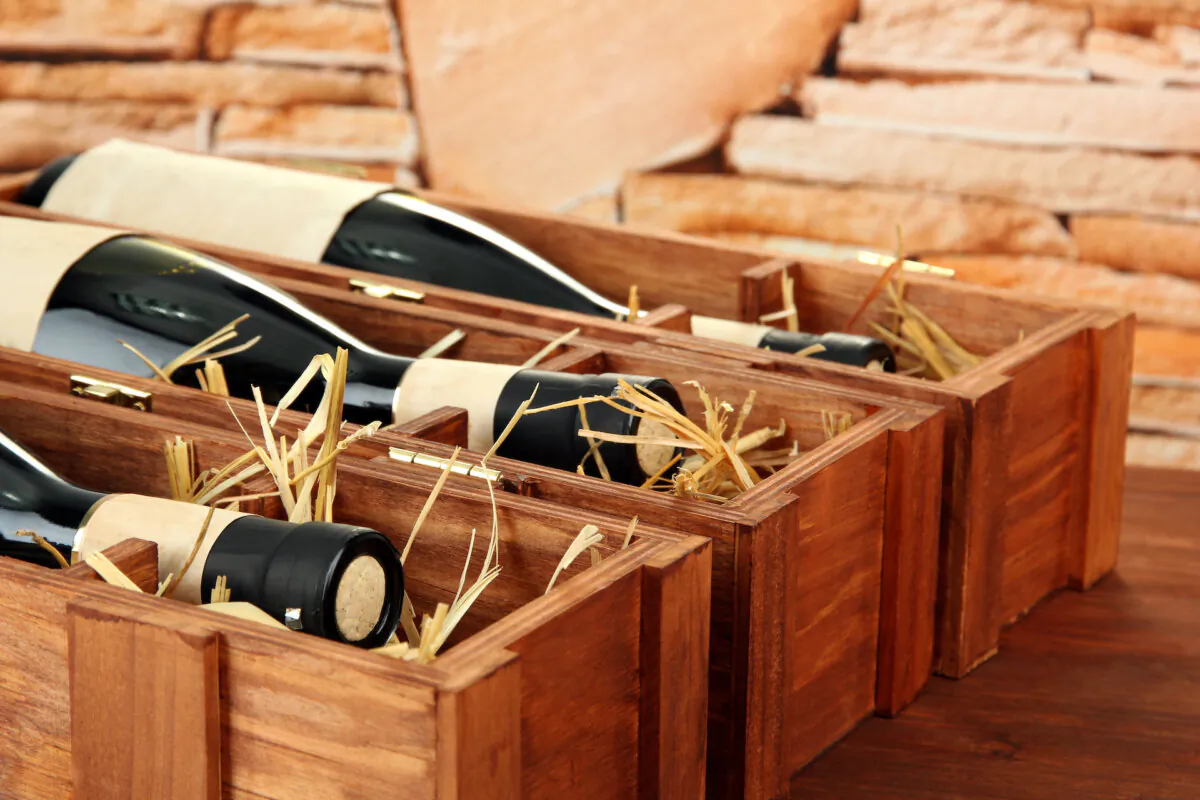Sometimes we buy a bottle of wine for its taste, but sometimes we buy it for its fancy packaging. (Africa Studio/Shutterstock)
