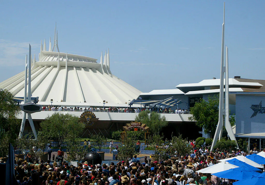 Crowds gather outside the re-launch ceremony of Disneyland's Space Mountain attraction at Disneyland in Anaheim, Calif., on July 15, 2005. (Matthew Simmons/Getty Images)