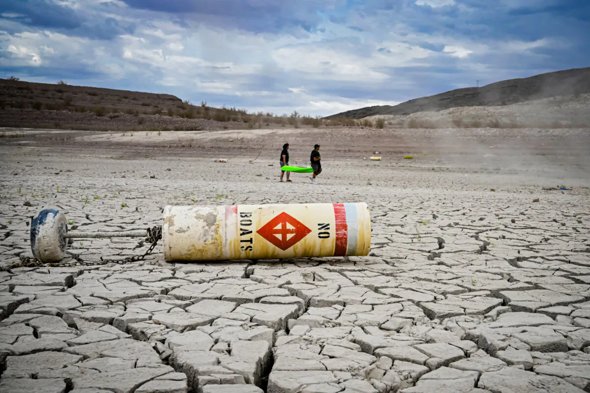 A buoy that reads “No Boats” lays on dry waterbed at Lake Mead, Nev., on July 23, 2022. Water levels in Lake Mead are at the lowest level since April 1937 when the reservoir was first filled with water, according to NASA. (Frederic J. Brown/AFP via Getty Images)