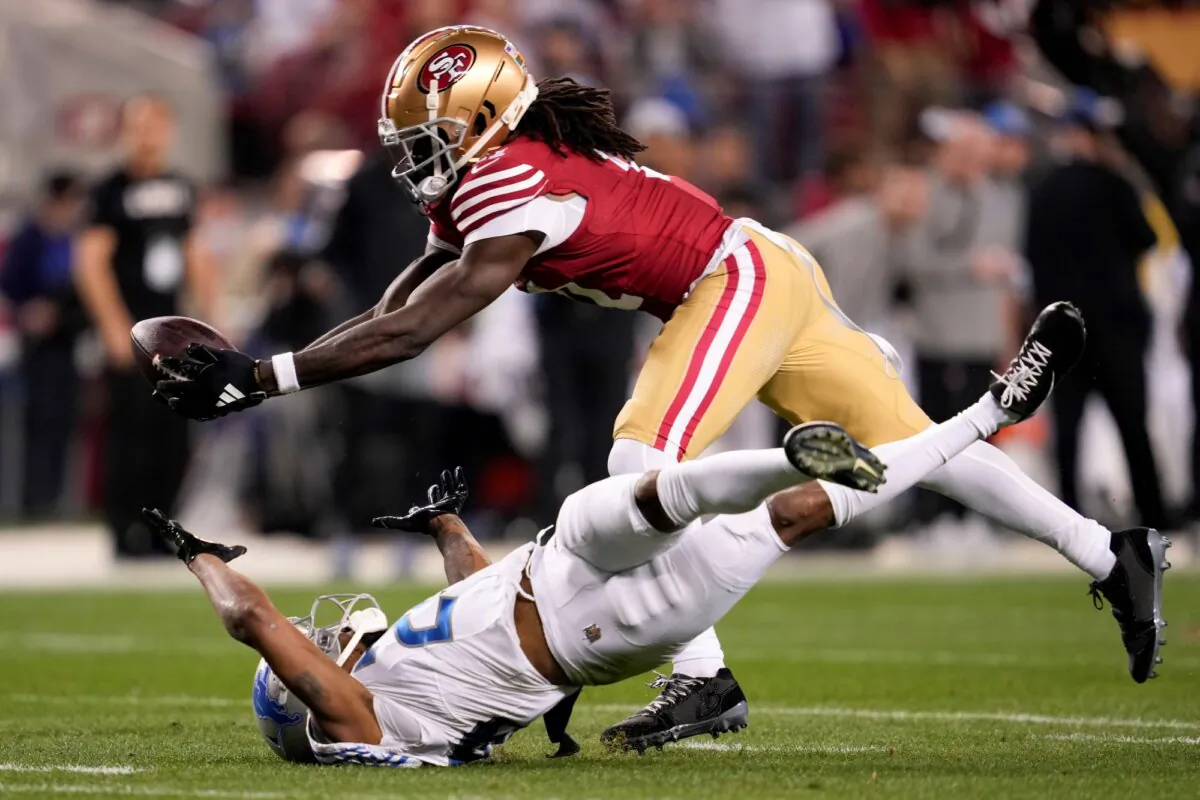 San Francisco 49ers wide receiver Brandon Aiyuk catches a pass against Detroit Lions cornerback Kindle Vildor during the NFC Championship Game in Santa Clara, Calif., on Jan. 28, 2024. (Godofredo A. Vasquez/AP Photo)