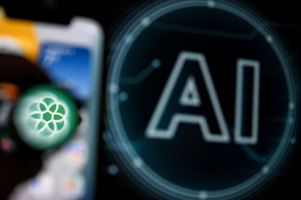 The ChatGPT application logo on a smartphone screen (L) and the letters AI on a laptop screen in Frankfurt am Main, Germany, on Nov. 23, 2023. (Kirill Kudryavtsev/AFP via Getty Images)