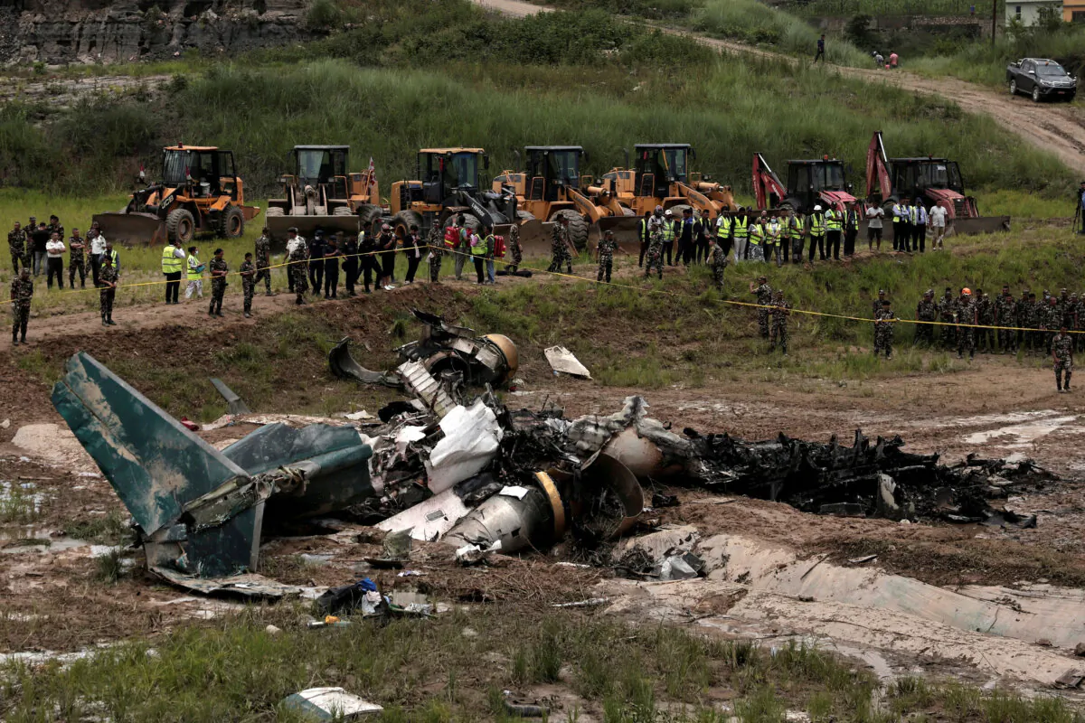 A view shows wreckage of a Saurya Airlines plane that caught fire after skidding off the runway while taking off at Tribhuvan International Airport, in Kathmandu, Nepal, on July 24, 2024. (Navesh Chitrakar/Reuters)