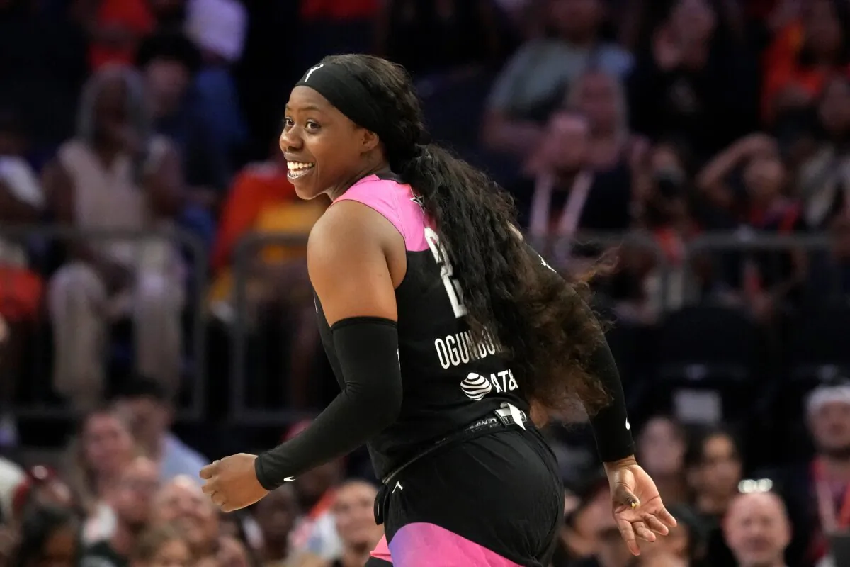 Arike Ogunbowale of the Dallas Wings celebrates during Team USA's victory over the U.S. Olympic team in the WNBA All-Star game in Phoenix on July 20, 2024. (Ross D. Franklin/AP Photo)
