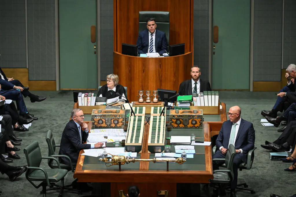 Australia's Prime Minister Anthony Albanese (Front L) sits across from opposition leader Peter Dutton (Front R) during Question Time at Parliament House in Canberra, Australia, on May 14, 2024. (Tracey Nearmy/Getty Images)