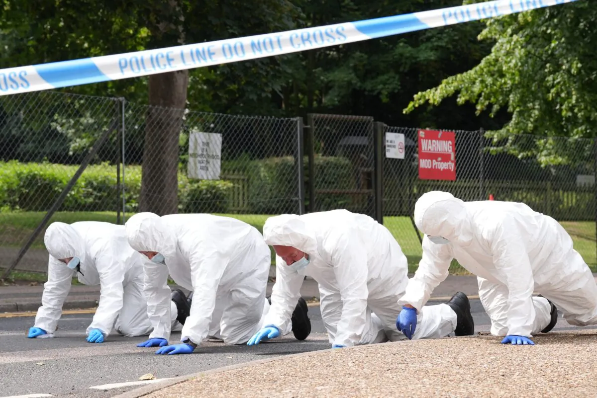 Forensic police search the cordoned crime scene in Gillingham, Kent, on July 24, 2024. (Gareth Fuller/PA)