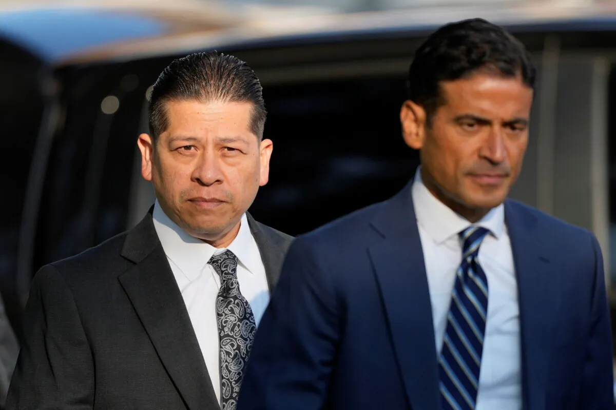 Former Uvalde Consolidated Independent School District police officer Adrian Gonzales, (L), arrives at the Uvalde County Courthouse for a court appearance, in Uvalde, Texas on July 25, 2024. (Eric Gay/AP Photo)