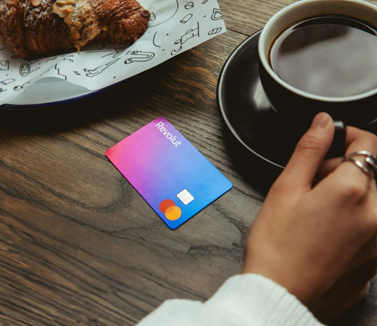Undated image of a  standard Revolut debit card on a table. (Revolut/UK)