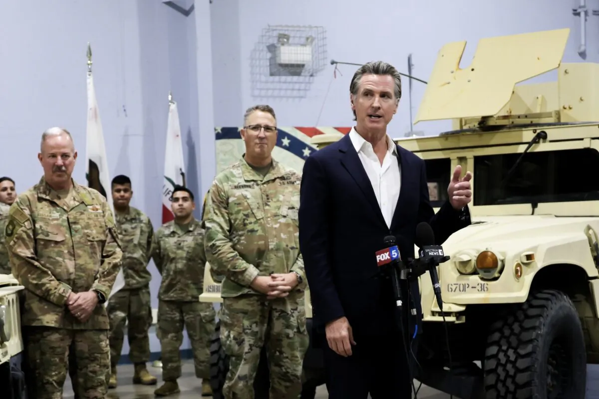 California Gov. Gavin Newsom with members of the California National Guard in a file photo. (Courtesy of Office of Gov. Gavin Newsom)