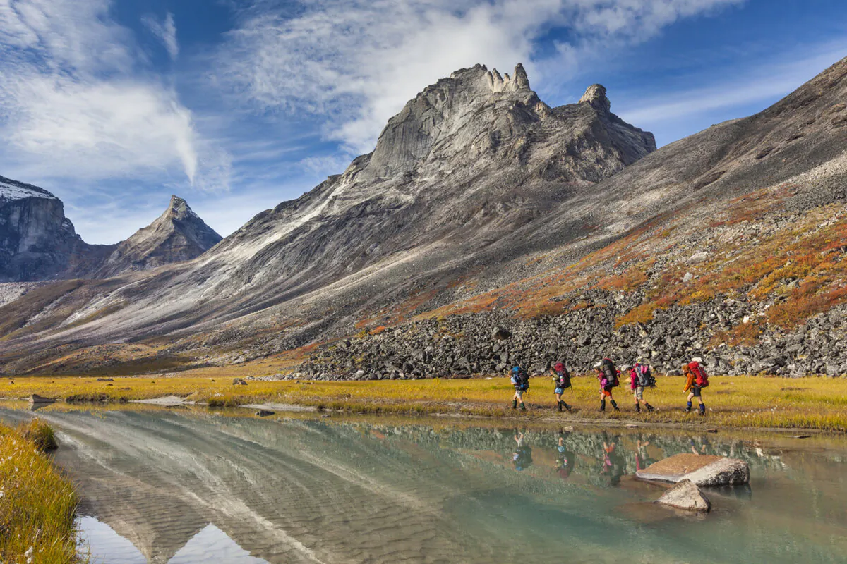 Backpackers trek along the shore of Arrigetch Creek at Gates of the Arctic National Park, Alaska. (Patrick J. Endres/Getty Images)