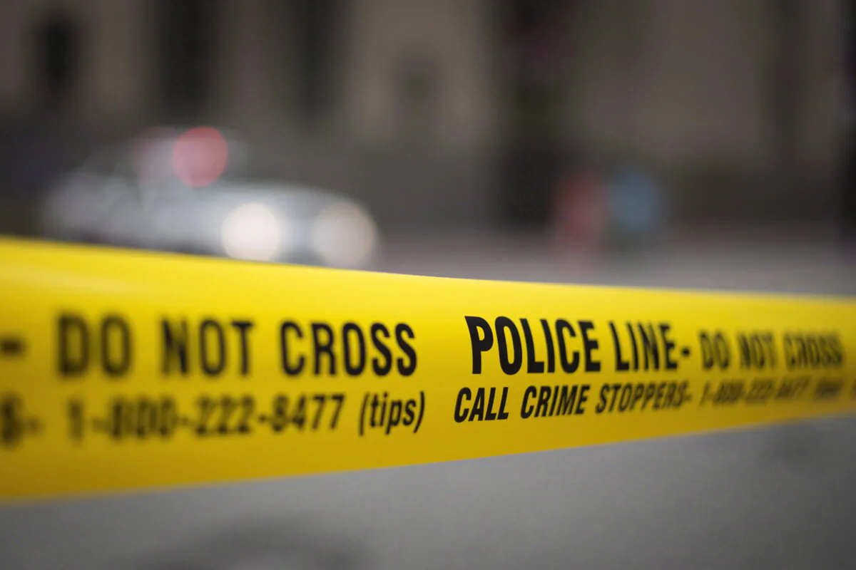 Police tape at a crime scene in Toronto in a file photo. (The Canadian Press/Graeme Roy) 