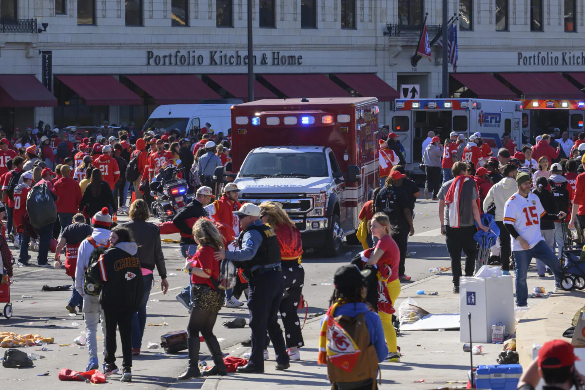 Police clear the area following a shooting at the Kansas City Chiefs NFL football Super Bowl celebration in Kansas City, Mo., Feb. 14, 2024. A 15-year-old who was among those charged with opening fire during the Kansas City Chiefs Super Bowl rally was sentenced to a state facility for youths on Thursday, July 25. (AP Photo/Reed Hoffmann)