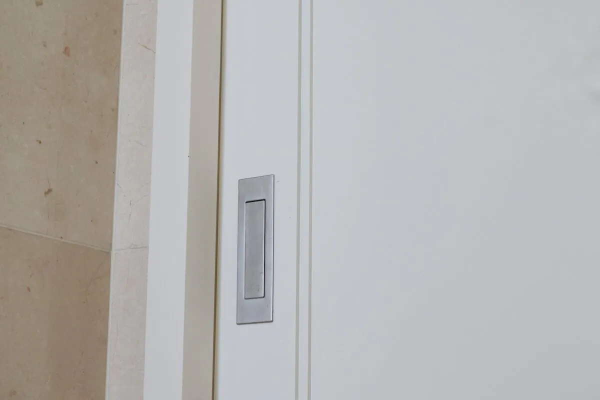 To save time, using a kit to install the pocket door will help greatly. (Tomy Handoyo/Shutterstock)