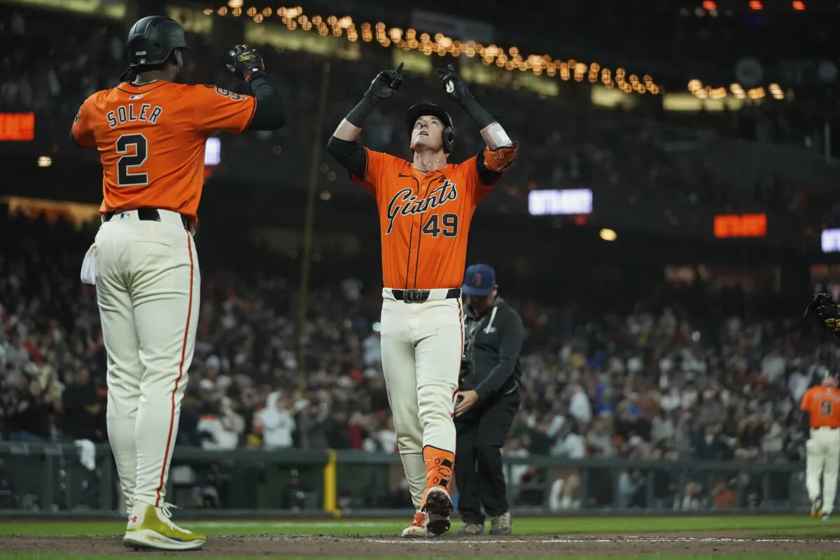 San Francisco Giants' Tyler Fitzgerald (49) celebrates in front of Jorge Soler (2) after hitting a two-run home run against the Colorado Rockies during the sixth inning of a baseball game in San Francisco on July 26, 2024. (Godofredo A. Vásquez/AP Photo)