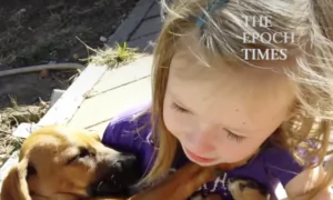 Girl Sings Dog to Sleep