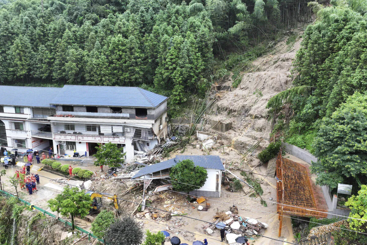 A landslide destroys a house in Yuelin village of Shouyue town of Hengyang city, central Hunan Province, China, on July 28, 2024. (Chen Zhenhai/Xinhua via AP)