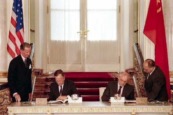 On July 31, 1990, American President George H.W. Bush (L) and Soviet President Mikhail Gorbachev sign START agreements detailing the mutual destruction of the two countries' nuclear arsenals. (Public Domain)